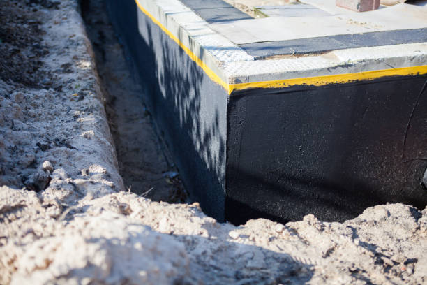 Professional Basement Waterproofing technician working in Pomona, NY